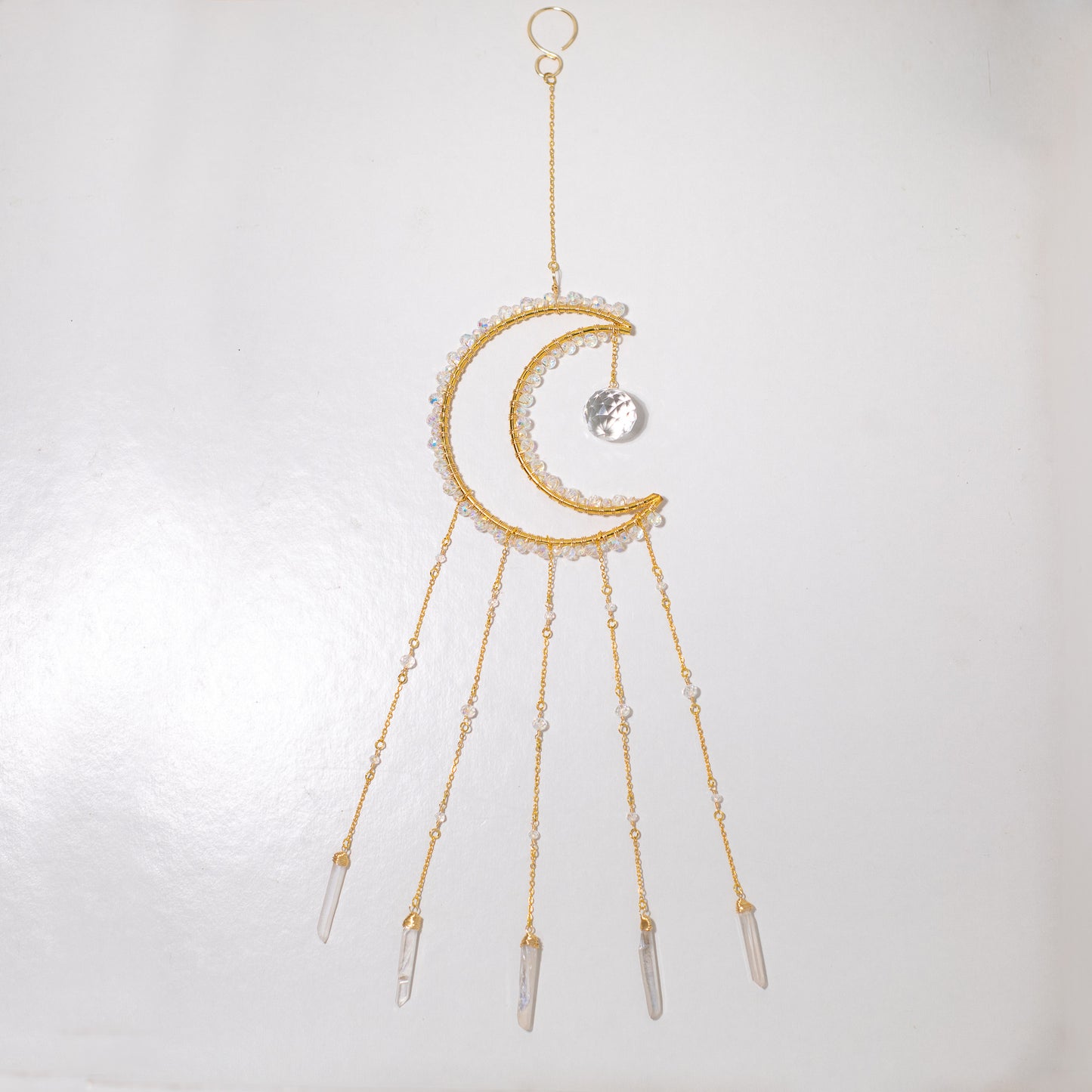 Atrapasol con prismas de cristal lunar