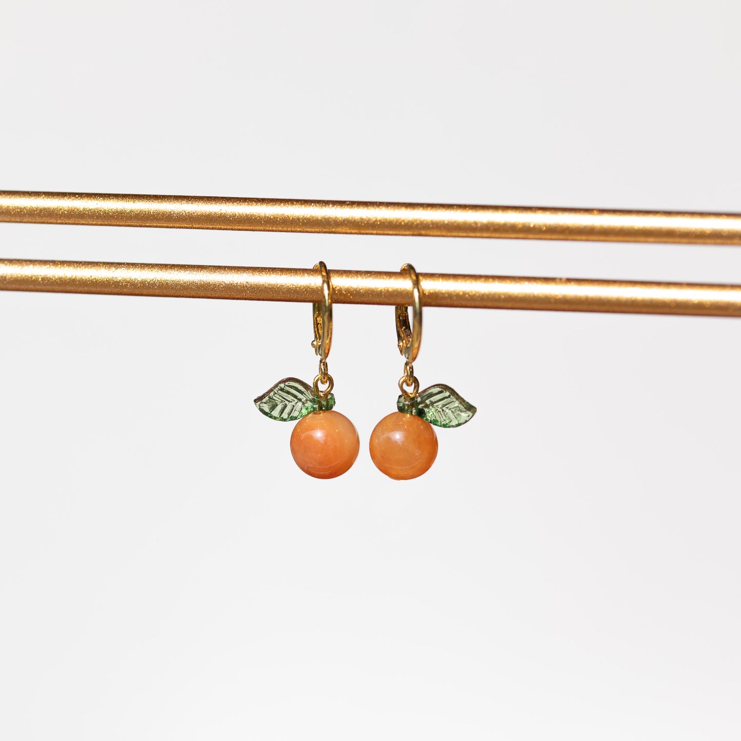 Pendientes Huggie naranjas