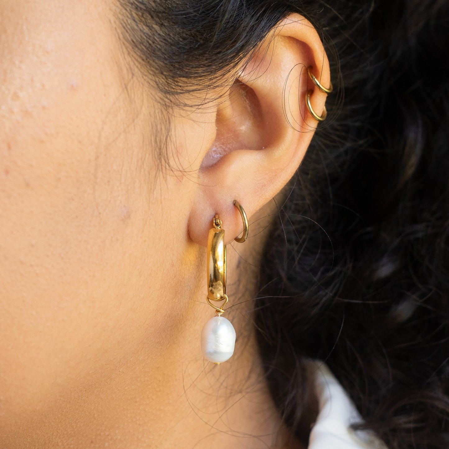 Aros de perlas caídas